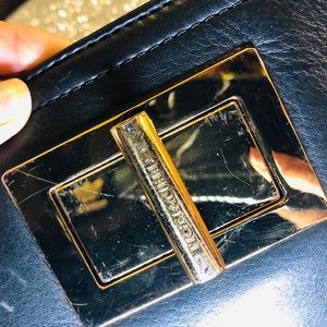 tignanello black leather clutch